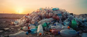 waste plastic bottles and other types of plastic waste at a waste disposal site.Generative AI