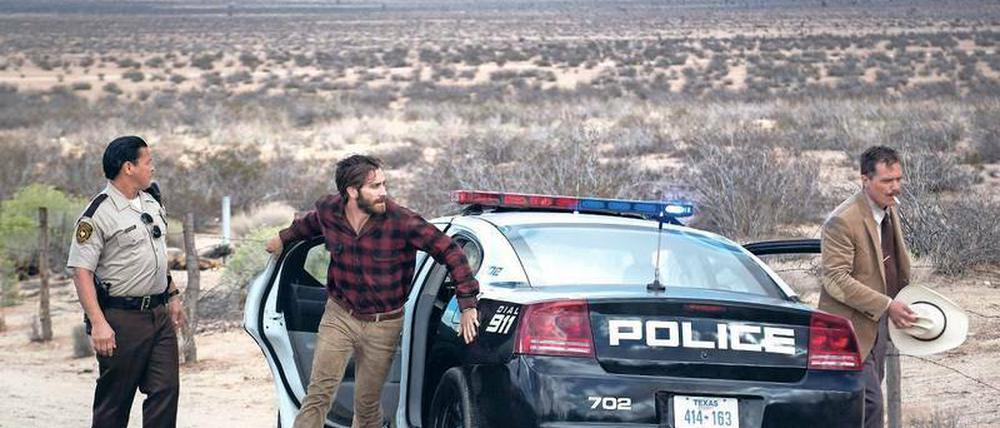 Lost Highway. Jake Gyllenhaal (Mitte) spielt eine Doppelrolle: als Schriftsteller und dessen Romanfigur. 