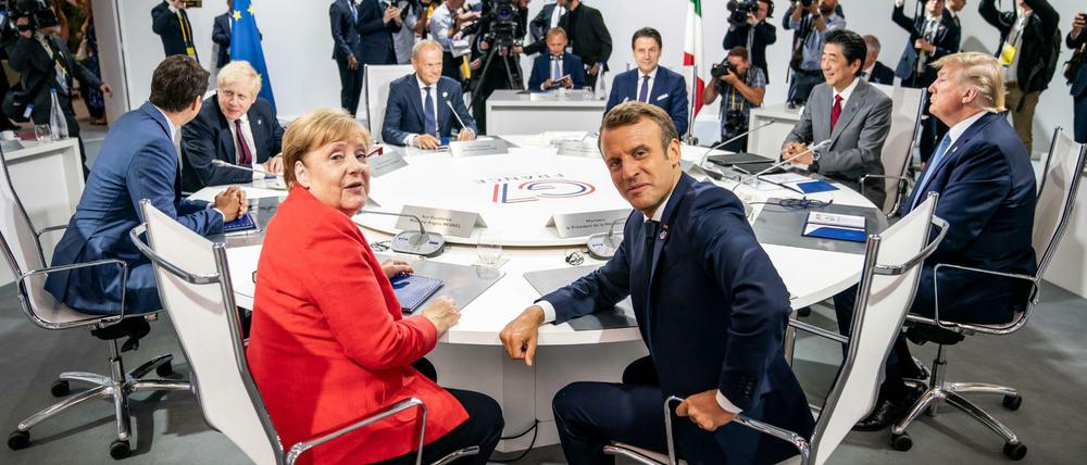 Dissens über Mercosur-Abkommen. Bundeskanzlerin Merkel und Frankreichs Staatschef Macron (im Vordergrund) in Biarritz.