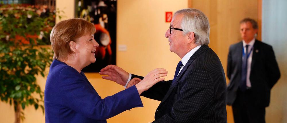 Kanzlerin Merkel und EU-Kommissionschef Juncker am Sonntag in Brüssel.